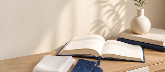 Folded compression socks styled with a travel notebook