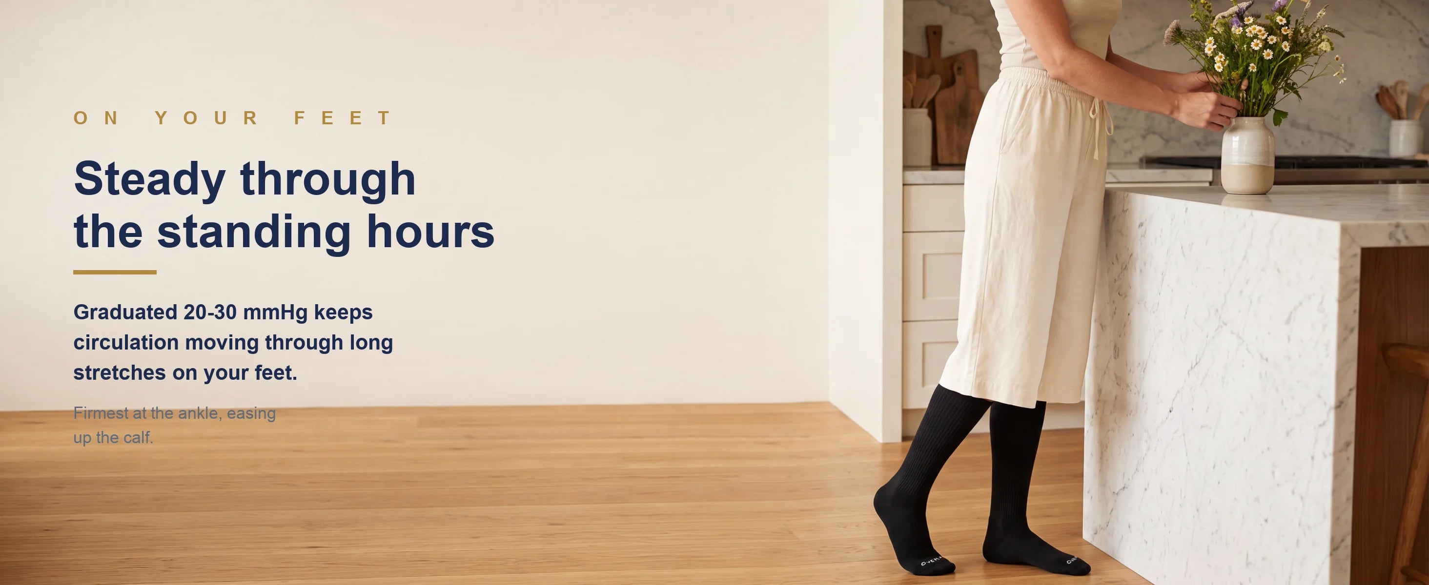 Steady through the standing hours — OVENA compression socks worn at home